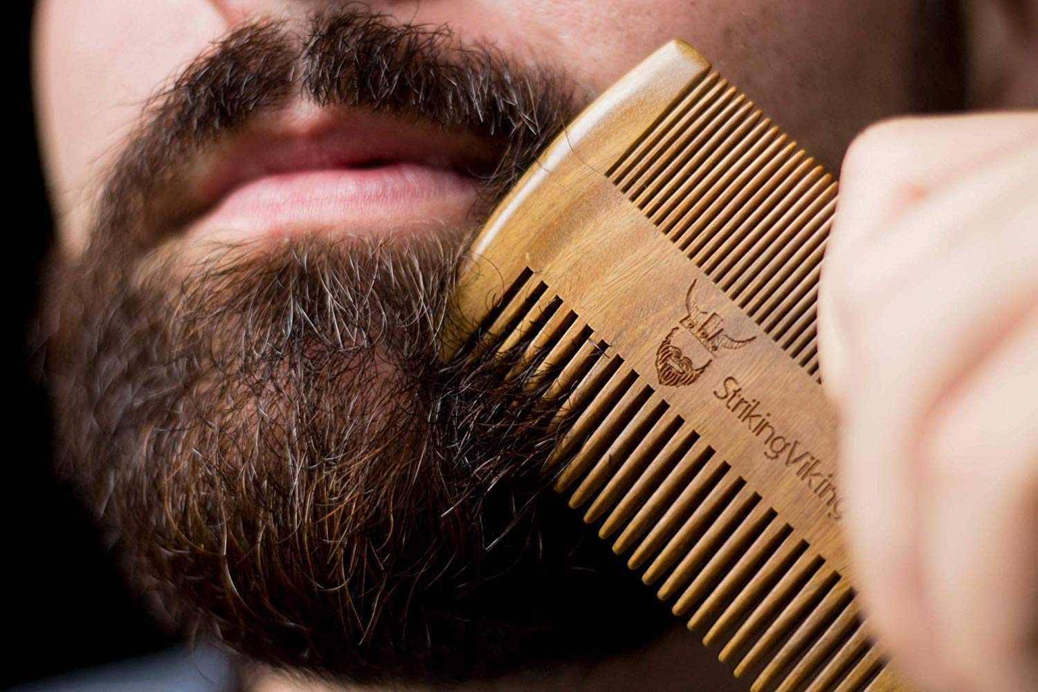 striking viking wooden beard comb