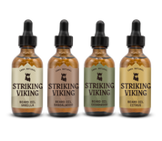 Beard Oil Variety 4 Pack Set featuring Vanilla, Sandalwood, Cedarwood, and Citrus scents in dropper bottles.