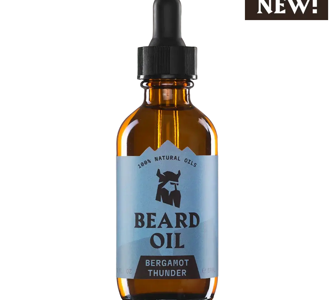 Beard Oil Bergamot Thunder in amber dropper bottle with blue label, natural organic ingredients for healthy soft beard care